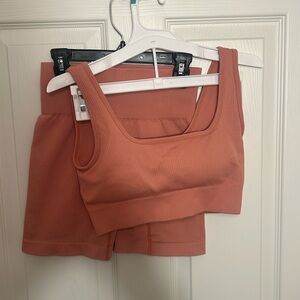 Mauve/Terra cotta colored work out set.